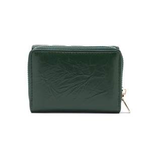 Dark forest green women's short wallet with crinkled leather texture and gold zipper