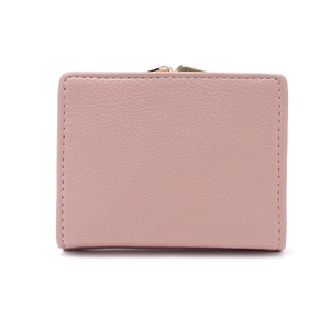 Minimalist light pink folding wallet with gold metal clasp and litchi grain texture