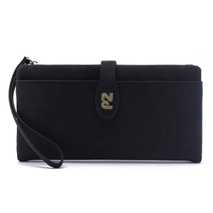 Detail view of black vintage long wallet with metal logo buckle and wrist strap texture