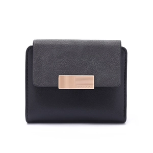 Detail of compact women's wallet with black and grey color block and gold metal buckle
