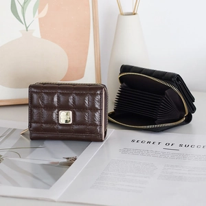 Close-up of diamond quilted PU leather wallet with multi-slot accordion card holder design