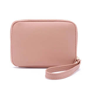 Macro shot of pale pink PU leather wallet showing fine texture and matching wrist strap