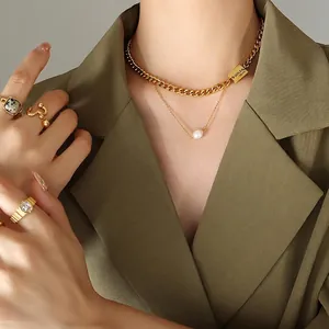 French vintage gold layered necklace with freshwater pearl and engraved charm pendant