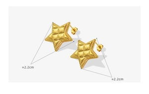 Detail of 2.2cm gold star earrings with quilted texture and beaded edge design