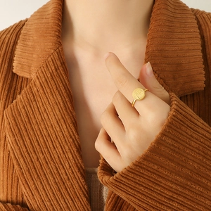 Minimalist 18k gold plated stainless steel ring with Fu character relief on circular disk