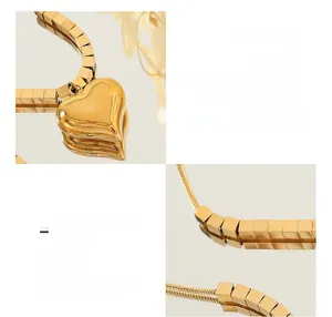 Dettaglio della collana con cuore in acciaio al titanio placcato oro 18 carati