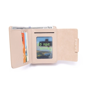 Detailed interior of a pink trifold wallet with card slots, ID window and cash compartment