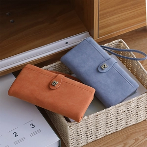 Detail view of large capacity long wallets with metal PZ buckle and woven hand straps