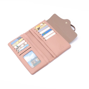 Detail view of pink PU leather wallet showing multi-card slots and clear ID window