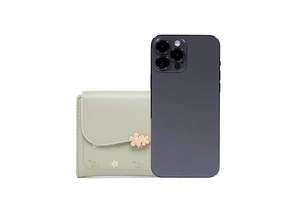Mint green floral embroidered wallet shown next to a smartphone for size reference