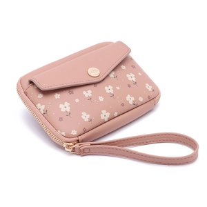 Pink floral leather passport wallet with gold button closure and wrist strap