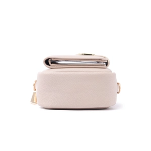 Detailed bottom view of pink litchi grain leather phone bag with gold hardware accents