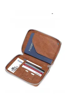 Brown litchi leather passport wallet interior showing card slots and SIM card holders
