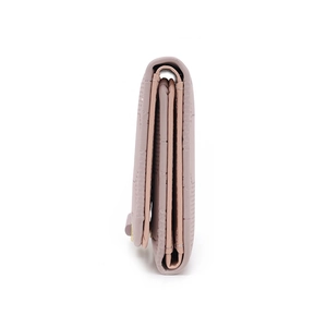 Side view showing multi-layer structure and thickness of pink tri-fold wallet