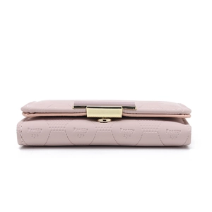 Detail of light pink PU leather wallet with hexagon quilting and gold metal buckle