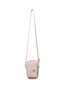 Detail of crossbody phone pouch in beige pebble leather with adjustable strap and gold buckle