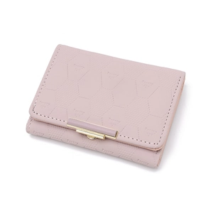 Quilted tri-fold short wallet in light pink with metallic trim and honeycomb pattern