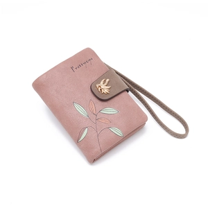 Dusty rose leather floral coin purse with golden leaf clasp and wristlet strap