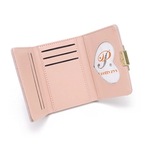 Pink lychee grain PU leather trifold wallet with heart ID window and gold buckle