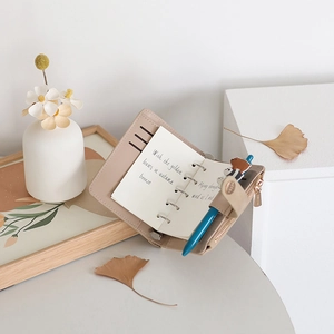 A6 PU leather loose-leaf notebook organizer with card slots and a zipper pocket
