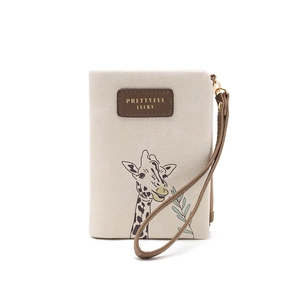 Detail view of cream PU leather coin purse with giraffe print and gold zipper closure