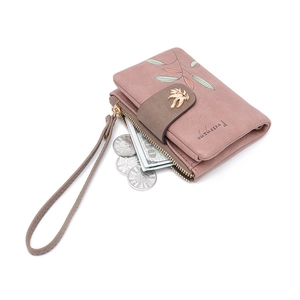 Pink matte wallet with leaf embroidery and bird clasp featuring coin pocket and wristlet