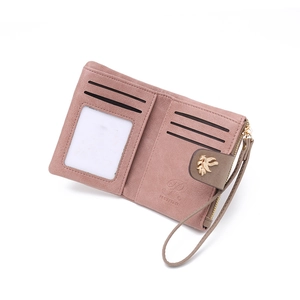 Dusty pink PU leather short bifold wallet for women featuring a metal leaf buckle detail