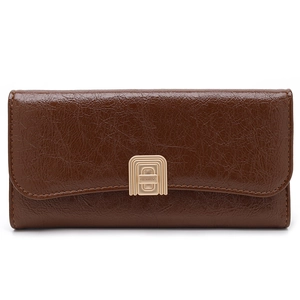 Detailed view of the brown textured leather wallet with a golden semi-circle metal clasp