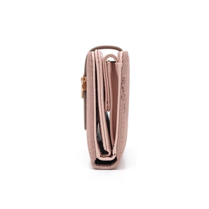 Side view of pink three-fold faux leather wallet showing internal card slots and thickness