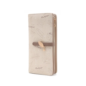 Beige faux leather long wallet for women featuring a printed leaf pattern and metal pendant