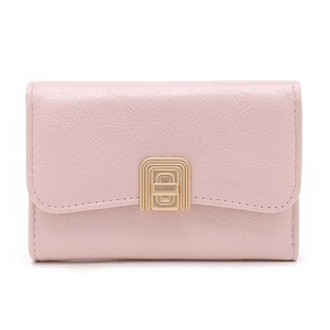 Close-up of pink leather folding wallet with gold rectangle clasp and engraved logo