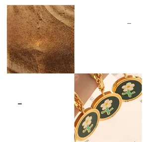 Detail of retro enamel daisy necklace and earrings set in 18K gold plated titanium steel