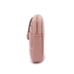Side view of pink faux leather wallet showing stitching details and gold zipper closure