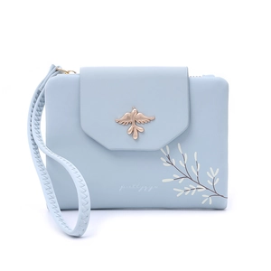 Detail of light blue PU leather wallet with gold bird buckle and floral pattern print