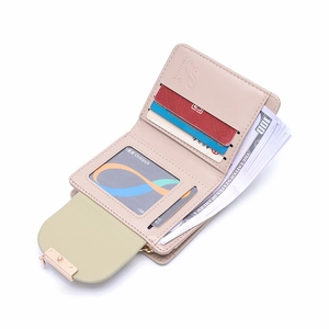 Detailed interior of a beige PU leather wallet with card slots, ID window and gold clasp