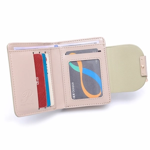 Detail view of the open faux leather bifold wallet showing multiple card slots and ID window
