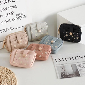 Floral PU leather coin purses in various colors with zipper closure and snap pocket