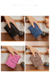 Close-up of vintage frosted short wallets for women with distinct white contrast stitching