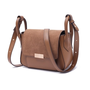 Brown leather and suede patchwork shoulder bag with golden rectangular buckle in side view