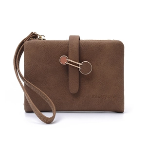 Detail of a brown matte leather wallet showing a metal ring with beaded chain buckle