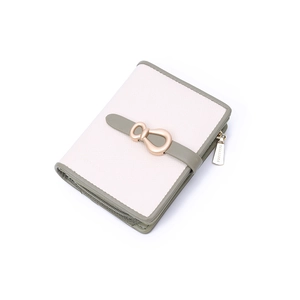 Detail of minimalist cream and olive green bi-fold wallet with gold clasp and zipper