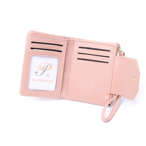 Pink short wallet interior detail with 5 card slots, ID window and zipper coin pocket