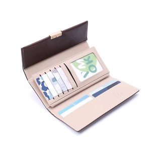 Women long trifold wallet in brown and beige leather with card slots and metal buckle