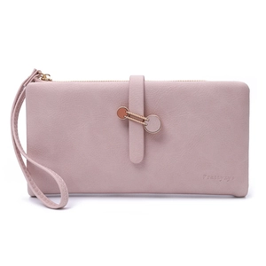 Detail of light pink PU leather long wallet with litchi texture and metal ring buckle