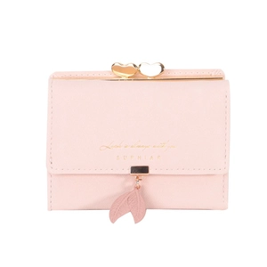 Short pink leather tri-fold wallet for women featuring a gold heart clasp and leaf pendant