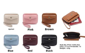 Detail view of colorful soft leather passport organizers with PZ metal logo and zip wristlet