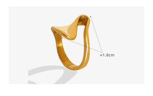 Macro view of polished wave-shaped gold ring with irregular fluid geometric curves