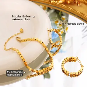 18K gold plated titanium steel jewelry set featuring a bead bracelet and hoop earrings