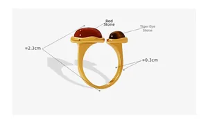 Detail of gold-plated ring featuring red stone, tiger eye, and sizing measurements