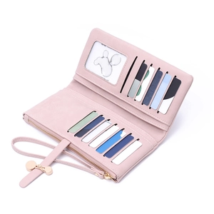 Close-up of pink long wallet interior with eleven card slots and a clear ID window